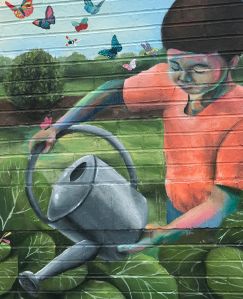 PHOTOBoywithWateringCanButterflies